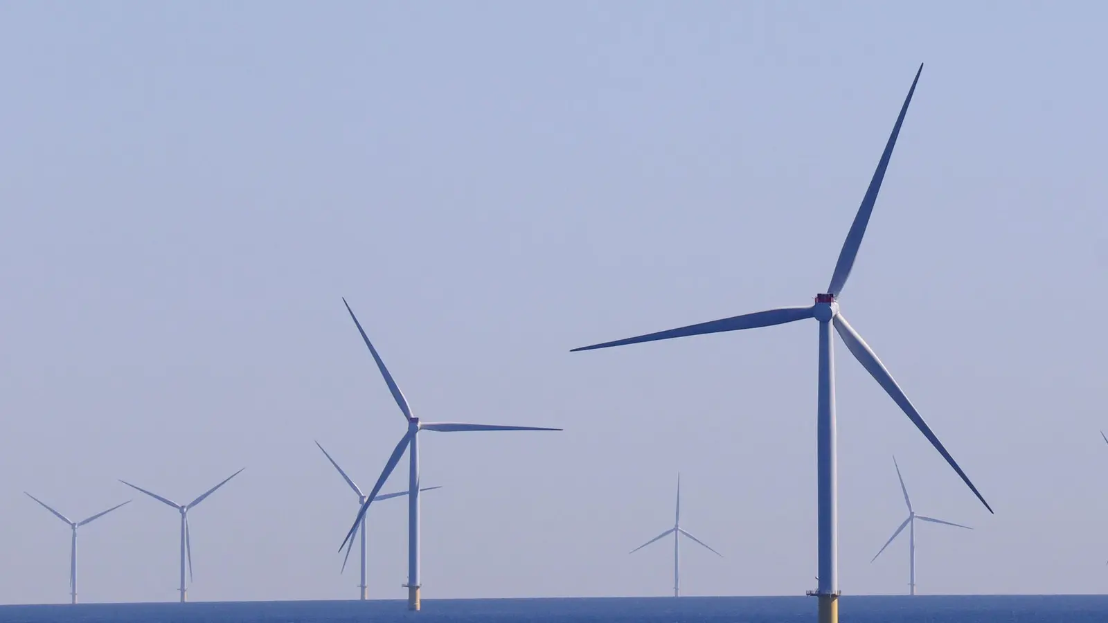 Offshore wind turbines standing in open sea